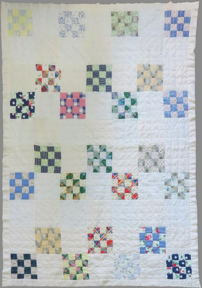 ANTIQUE / VINTAGE QUILT / QUILTED BLANKET: An antique / vintage handmade quilt. Measures: 77" x 56"