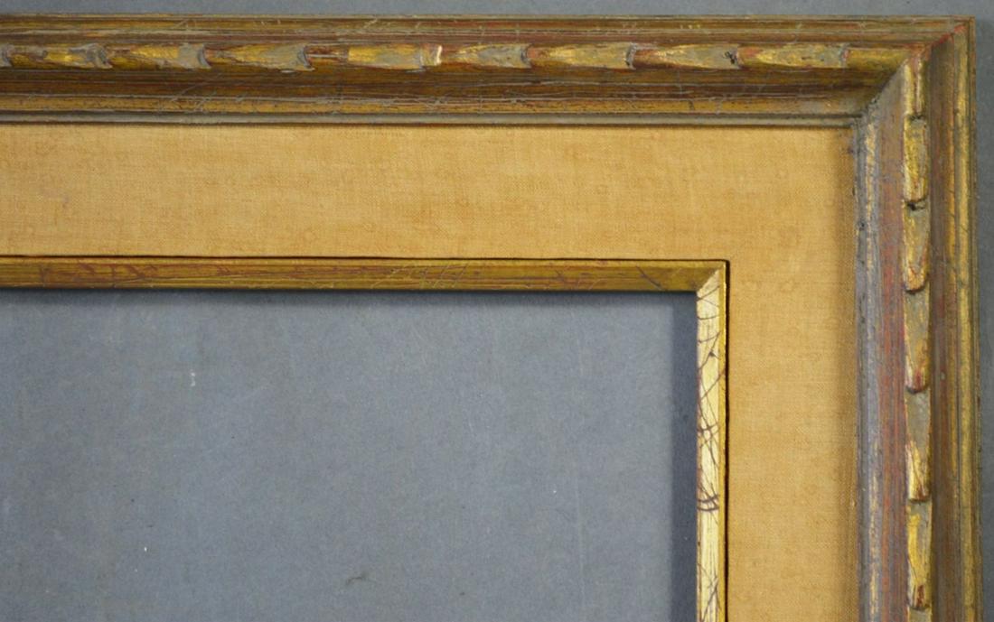 MID CENTURY MODERNIST CARVED PAINTING FRAME: An appealing mid century modernist carved frame with a linen liner and gilt edge inner liner. Measures: 21 1/2" x 24 1/2" Rabbet: 19" x 22"