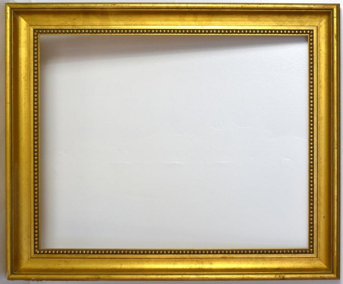 VINTAGE WOOD CARVED & GILT PAINTING FRAME: A vintage figured wood gilt painting frame. Measures: 31 3/8" x 26 3/8" Rabbet: 26 1/8" x 21 1/8"
