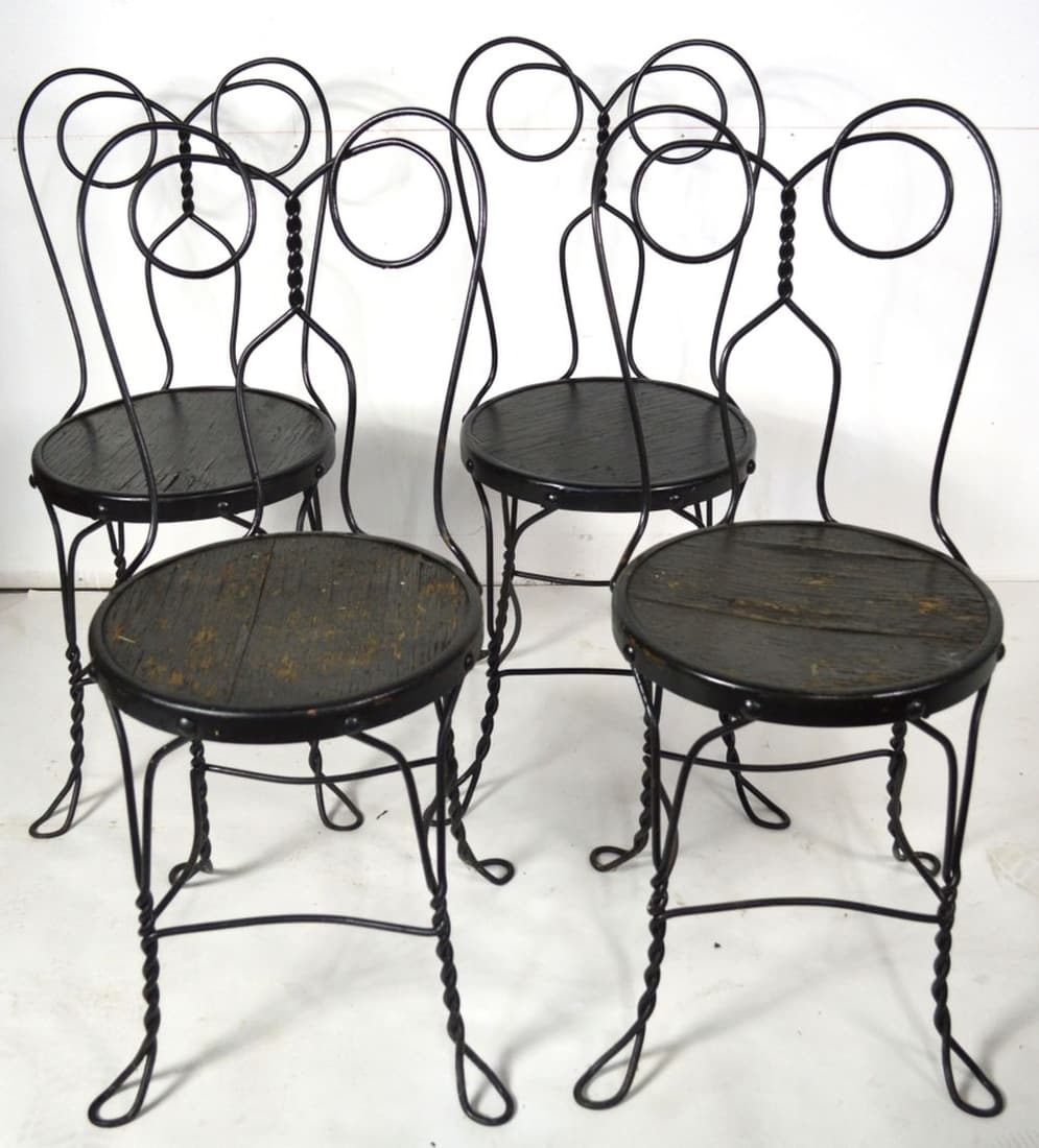SET 4 VINTAGE METAL CAFE / PARLOR CHAIRS: A good set of 4 French cafe / ice cream parlor chairs. Composed of gracefully bent and curved metal and wood seats. Measures: H 34" x W 14 1/2" x D 20"