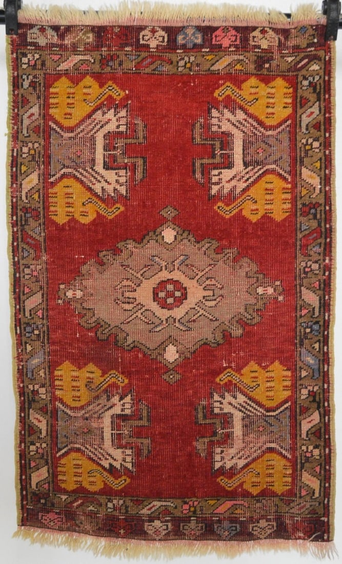 ANTIQUE ANATOLIAN YASTIK: An antique central Anatolian Yastik. Likely 1st/2nd Q. 20th C, and of a Konya area origin. Measures: 33" x 20 1/2"