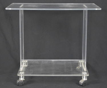 LUCITE MID CENTURY MODERN ROLLING BAR CART: A modern lucite bar cart / entertainment cart with casters. 2 levels. Measures: H 23" x W 27" x D 16"