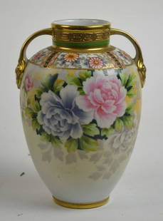 FINE 2 HANDLE ANTIQUE NIPPON HAND PAINTED VASE: A fine antique Nippon (mark to base) hand painted / gilt 2 handled porcelain vase. Measures: H 9" x Dia 6"