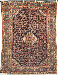 ANTIQUE PERSIAN ORIENTAL CARPET RUG: An antique Persian hand woven carpet. Rug is well made and exhibits very good colors and design. Likely late 19th/early 20th C. and possibly from the Heriz area. Measures: 59" x 77"