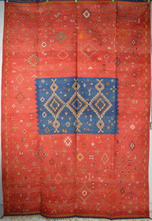 MOROCCAN ROOM SIZE CARPET VINTAGE: A very appealing semi-antique Moroccan flat weave carpet with jajim type figural embroidery. The rug is room size and has the original braided fringe intact. A visually enchanting carpet. Likely 2nd h