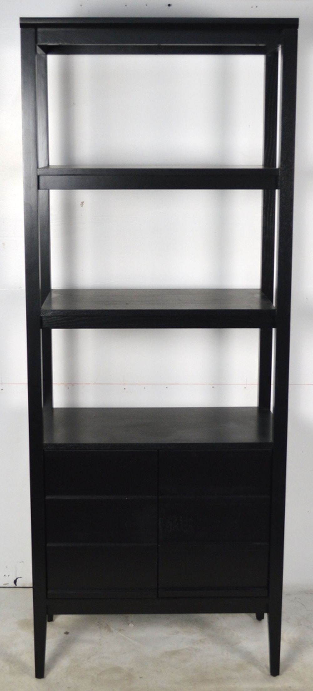 CRATE & BARREL BLACK HIGH SHELVING CABINET UNIT: A Crate & Barrel shelving unit. Unit is of black wenge wood and consists of both shelving and a bottom storage unit / cabinet with doors. Measures: H 72 1/2" x W 28" x D 28"