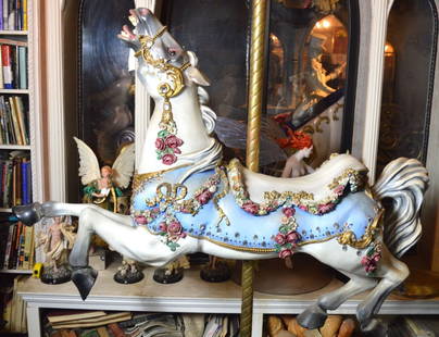 CAROUSEL HORSE HISTORIC PROP THEATRICAL PRODUCTION: This Carousel horse is a direct descendant of a 19th century piece researched by the designer. It was first sculpted and then cast in fiberglass with a brass pole for strength as well as design. Show: