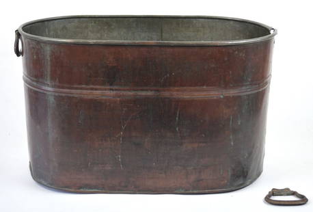 ANTIQUE COPPER BOILER TUB: An antique copper boiler tub / basin. Good primitive piece with a rustic look / patina. Measures: H 13 1/2" x W 23" x D 12"