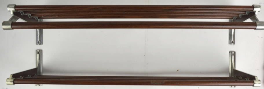 MID CENTURY MODERN VOGEL PETERSON COAT RACK: An unusual 2 piece Vogel Peterson metal (aluminum) and wood grain, wall mounted, coat and hat rack system. Believe to have been purchased in the mid 1960's.Measures: 36" x 6 1/2" x 12"