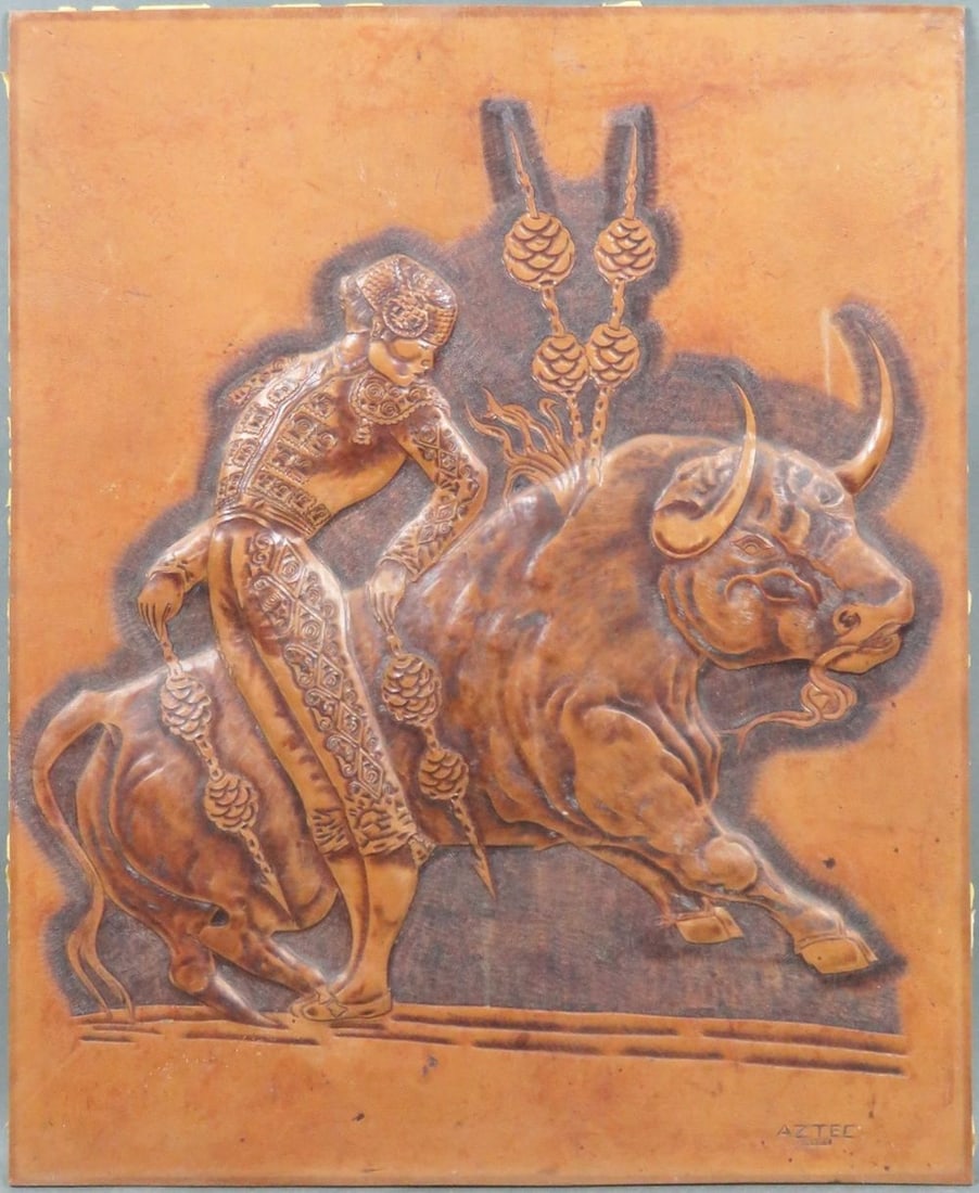 MID CENTURY BULLFIGHTING INTAGLIO SCULPTURE: Vintage mid-century modern embossed leather sculptural "Bullfight" themed wall sculpture. The work is a product of Aztec Mexico Studios. It is unframed. Measures: H 28" x W 22"