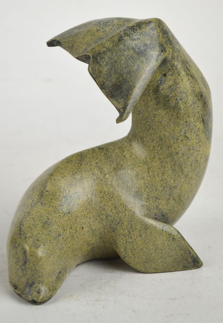 KAKEE PETER NEGEOSEAK WHALE SCULPTURE SIGNED: Kakee (Peter) Negeoseak (Inuit/Cape Dorset/Kinngait B. 1973). A good carved stone sculpture of a Beluga Whale. The work is signed/incised to base. Measures: 7" x 7" x 4"