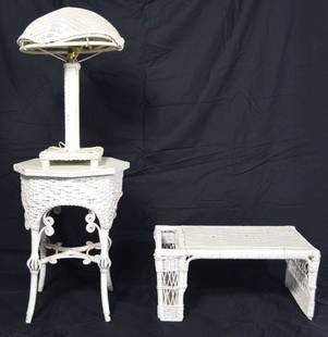 3 VINTAGE WICKER FURNITURE PIECES INC LAMP: A grouping of 3 wicker pieces. Includes a wicker lamp with woven wicker shade, side table, and a "dining in bed" tray, complete with magazine/tablet pocket. Measures: Largest W 22" x H 10" x D 14"