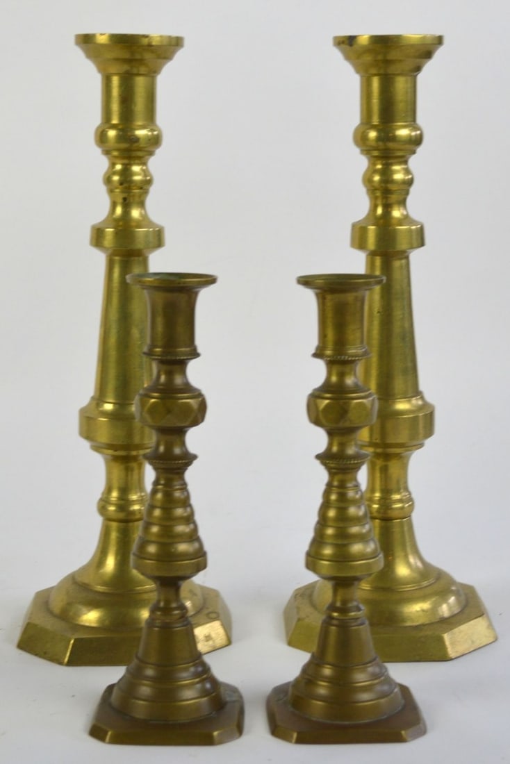 2 PAIR VINTAGE BRASS CANDLE STICKS: 2 Pair of vintage brass candlesticks. Largest Measures: H9" x W 3" x D 3"
