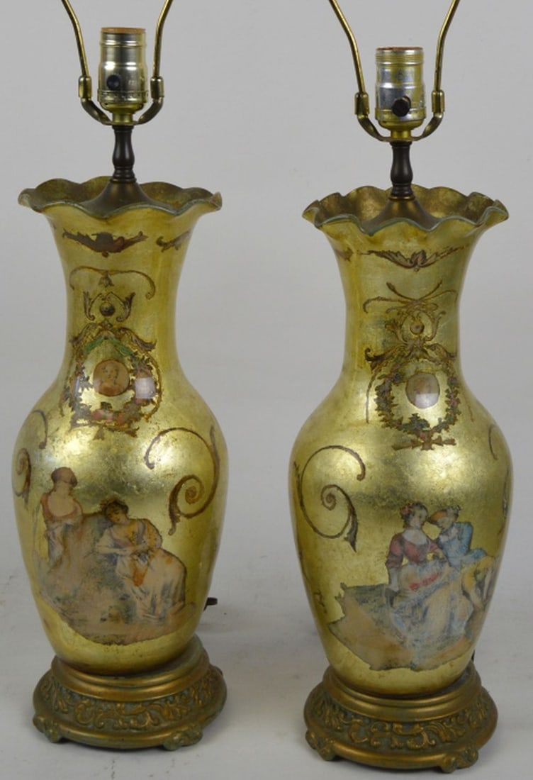 PAIR FRENCH DECOUPAGE DESIGN VASE FORM LAMPS: A pair of French style decoupage glass and gilt decorated vase form lamps. Lamps have patinated metal bases and ruffled top edges. Measures: H 29" x W 6" x D 6"