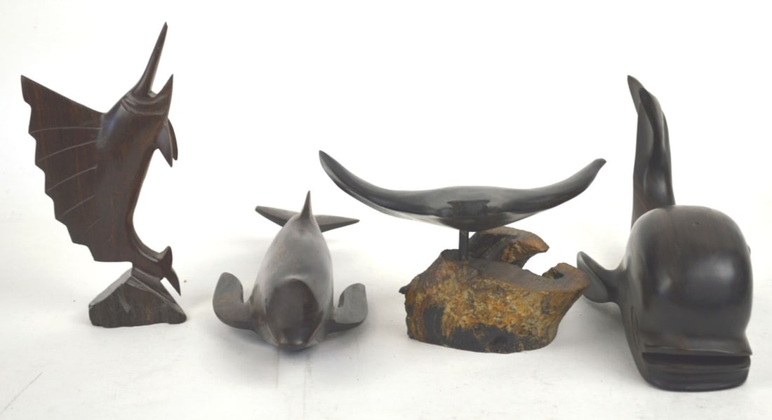 4 CARVED ROSEWOOD MARINE SCULPTURES: A grouping of 4 solid rosewood carved marine animal sculptures. The works are well done and are not signed. The ray is mounted on a wooden pedestal. Measures: Largest 5" x 11" x 5