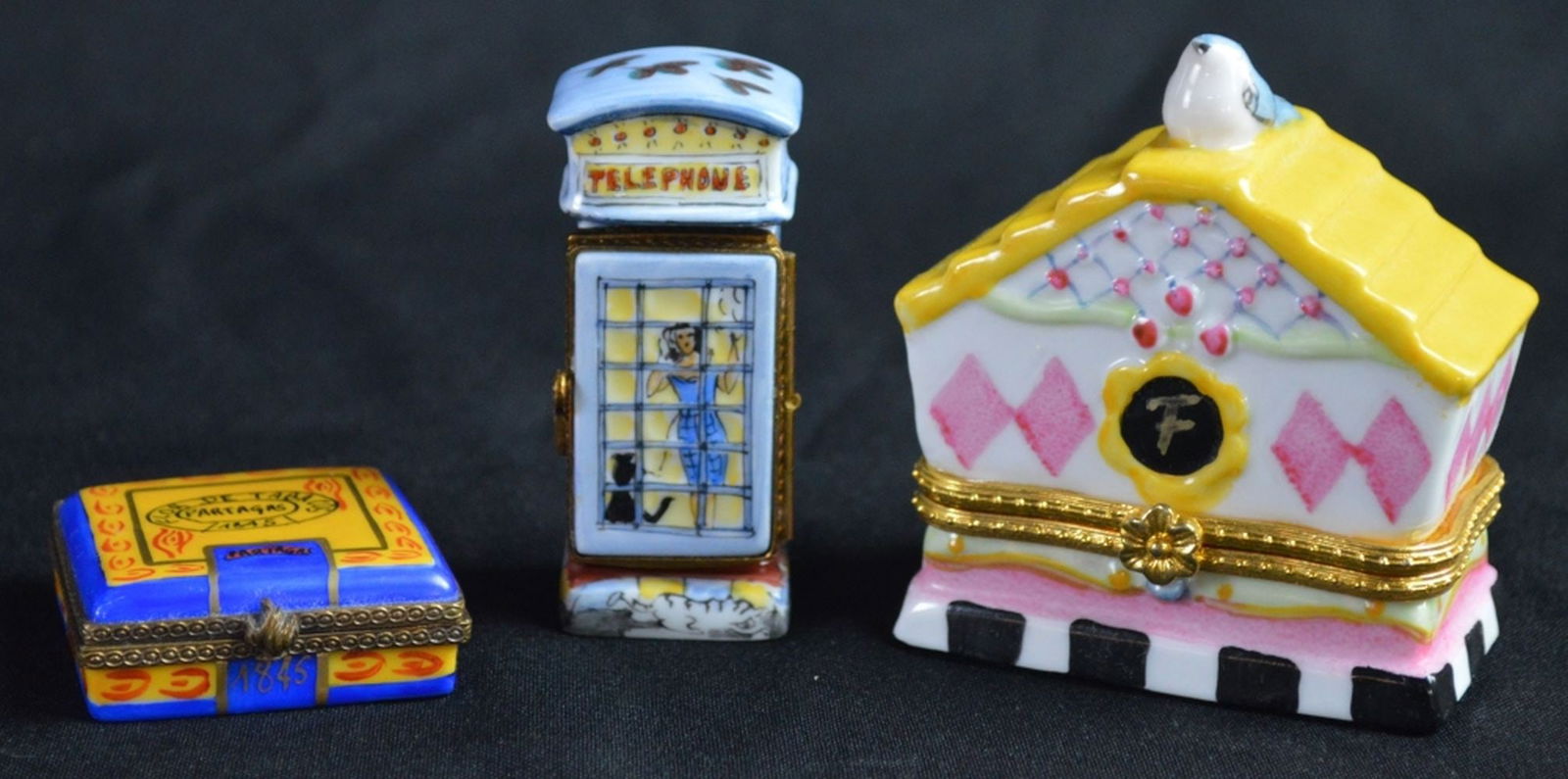3 PC LIMOGES PILL BOX HAND PAINTED PORCELAIN: 3 pieces of Limoges hand painted porcelain boxes. One a Partagas cigar box with miniature cigars, one a phone booth with a removable phone. 2 signed, one unmarked.