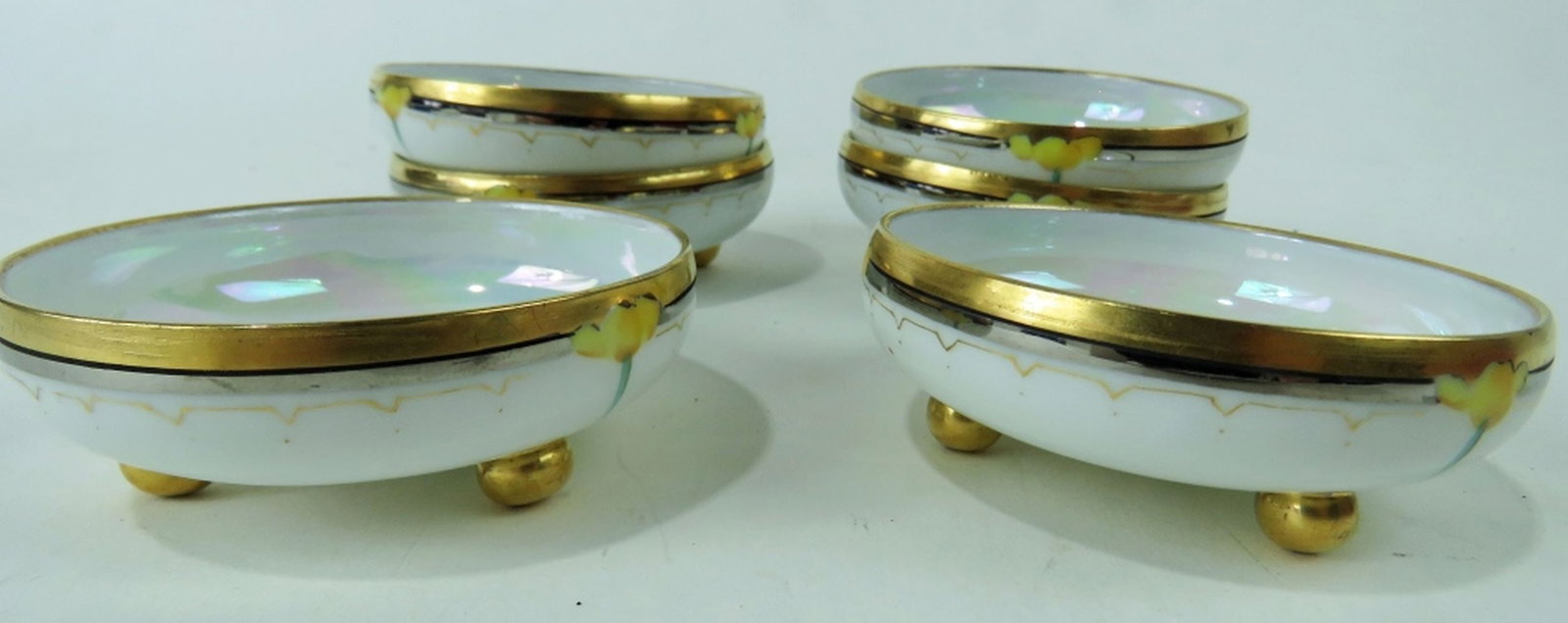 SIX ANTIQUE O&EG ROYAL AUSTRIAN FOOTED SALT BOWLS: Six Antique O&EG Royal Austria AUSTRIAN FOOTED SALT BOWLS. Measures Largest H 1", D 3 7/8"