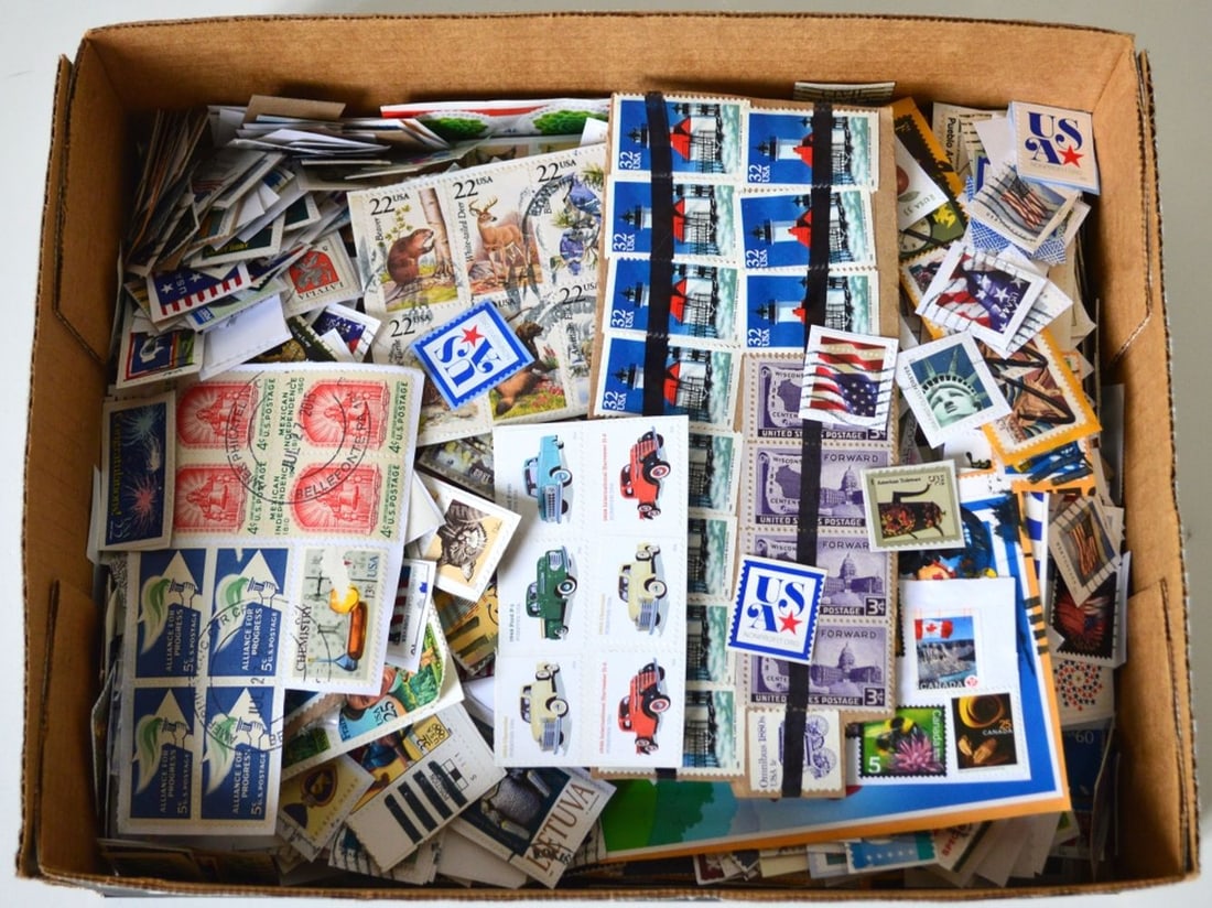 LARGE LOT OF STAMPS: A large lot (several pounds) of stamps. Most franked and most international.