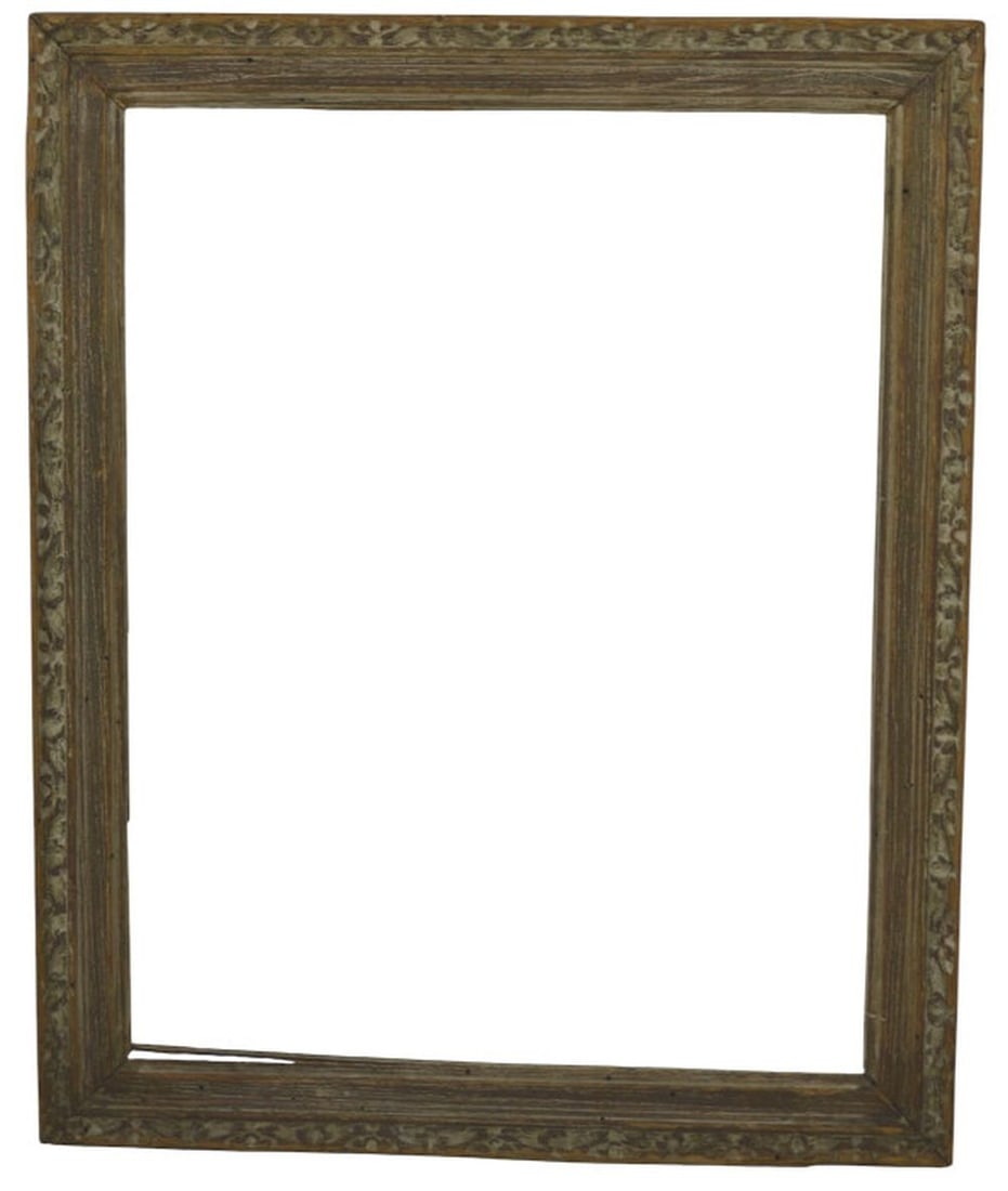 CARVED ITALIAN WORMY WOOD FRAME: A carved Italian design wormy wood frame. Measures: 21 1/2" x 17 1/2" Rabbet: 18 1/2" x 14 1/2"