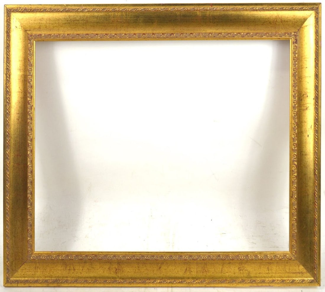 CLASSICAL CONCAVE RAISED EDGE GILT COVE FRAME: A contemporary raised edge reverse cove concave gilt frame. Measures: 19 1/4" x 24 1/4" Rabbet: 14 3/4" x 19 3/4"