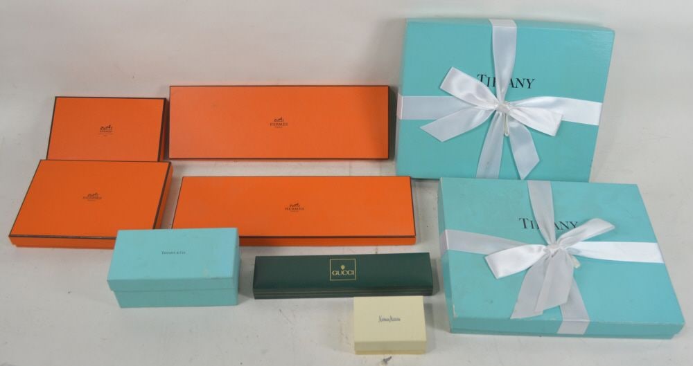HERMES TIFFANY GUCCI GIFT BOX GROUPING: A grouping of Hermes, Tiffany, Nieman Marcus, and Gucci (watch case) retail packing / gift boxes. Measures: Largest 10" x 13" x 2"