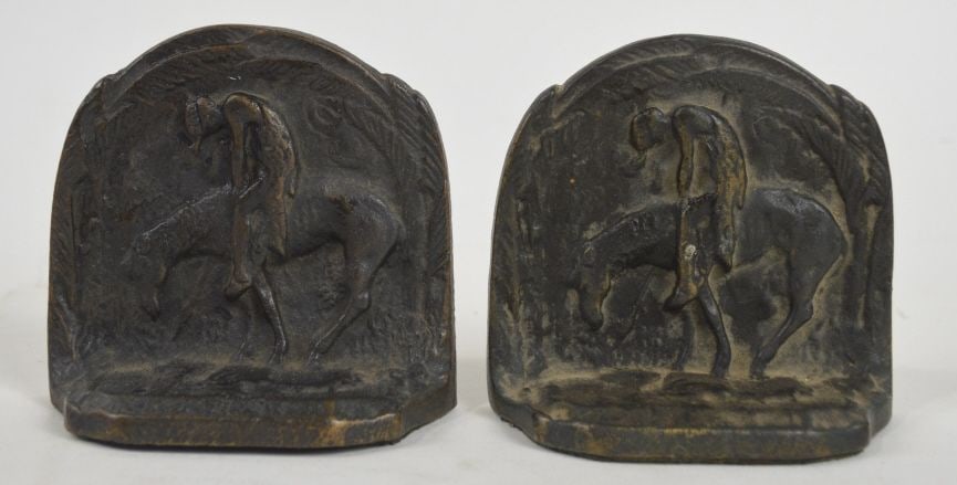 VINTAGE NATIVE AMERICAN INDIAN BOOKENDS: Vintage cast metal Native American Indian bookends Measures: 4" x 4" x 2"