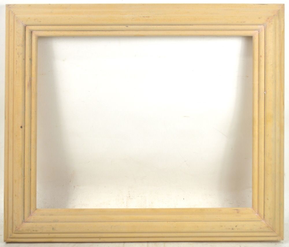 CARVED WOOD MODERNIST FRAME: A nicely figured, solid wood, modernist frame in unfinished wood. A gilt or ebonized finish would result in a spectacular frame. Measures: 24" x 20" Rabbet: 19 3/8" x 15 3/8"