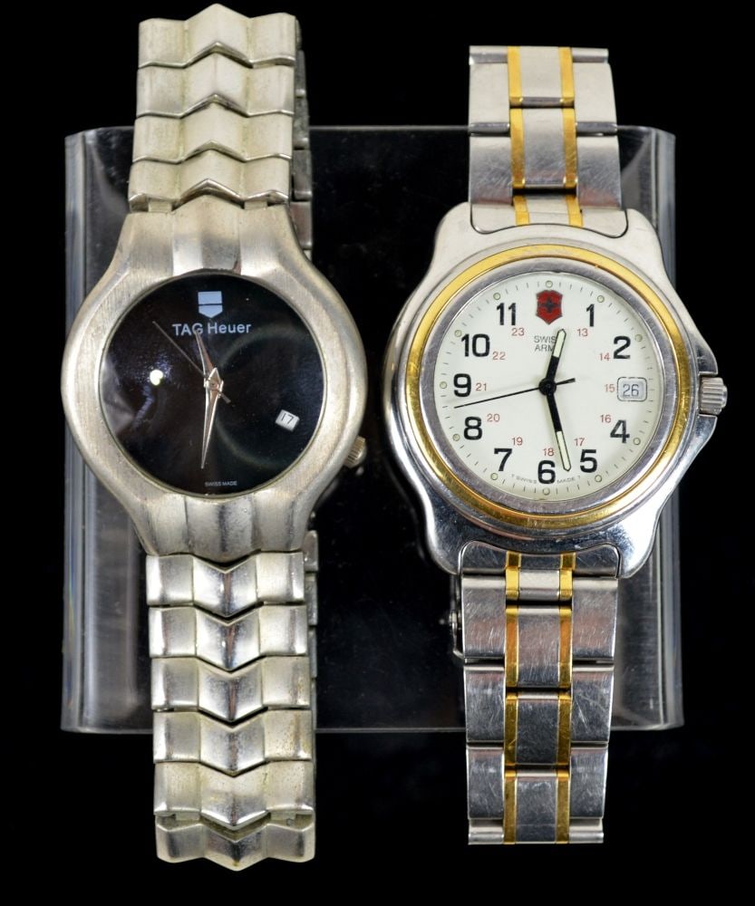 TAG HEUER ALTER EGO & SWISS ARMY WATCH: A GENUINE Tag Heuer Alter Ego watch coupled with a Swiss Army watch. Both on stainless steel bracelets. Both watches in need of new batteries. NOTE: TAG HEUER is GUARANTEED to function with a new batt