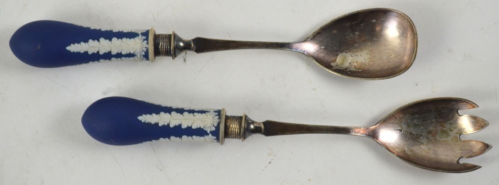 WEDGWOOD JASPERWARE SERVING SPOON SET W HALLMARK: A pair of antique Wedgwood cobalt jasperware serving spoon set. The set bears a hallmark (a 3 lobed figure with a B in each lobe / SN / a club with 3 stars in each lobe / P - followed by an illegible