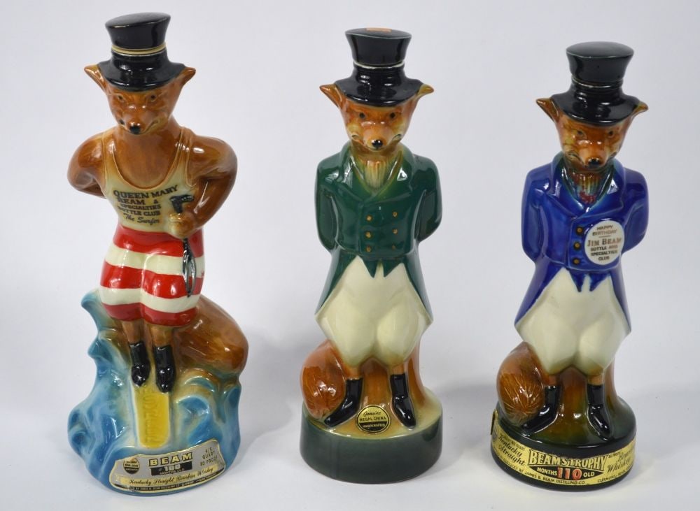 3 JIM BEAM REGAL CHINA CHARACTER BOTTLES: A group of 3 Jim Beam Regal China porcelain figures. Dated as follows: 1 X 1975 - 2 undated. Measures: 12 3/4" x 4 1/2" x 4 1/2"
