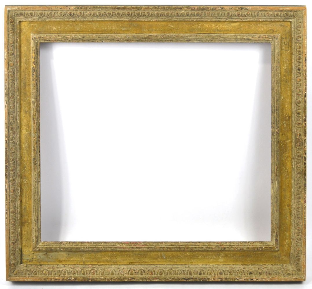 FINE FRENCH GALLERY FRAME: A fine gallery frame with a mustard gilt cassetta strip and outer egg and dart carved boarder. Measures: 25 1/2" x 21 1/2" Rabbet: 20 1/4" x 16 1/4"