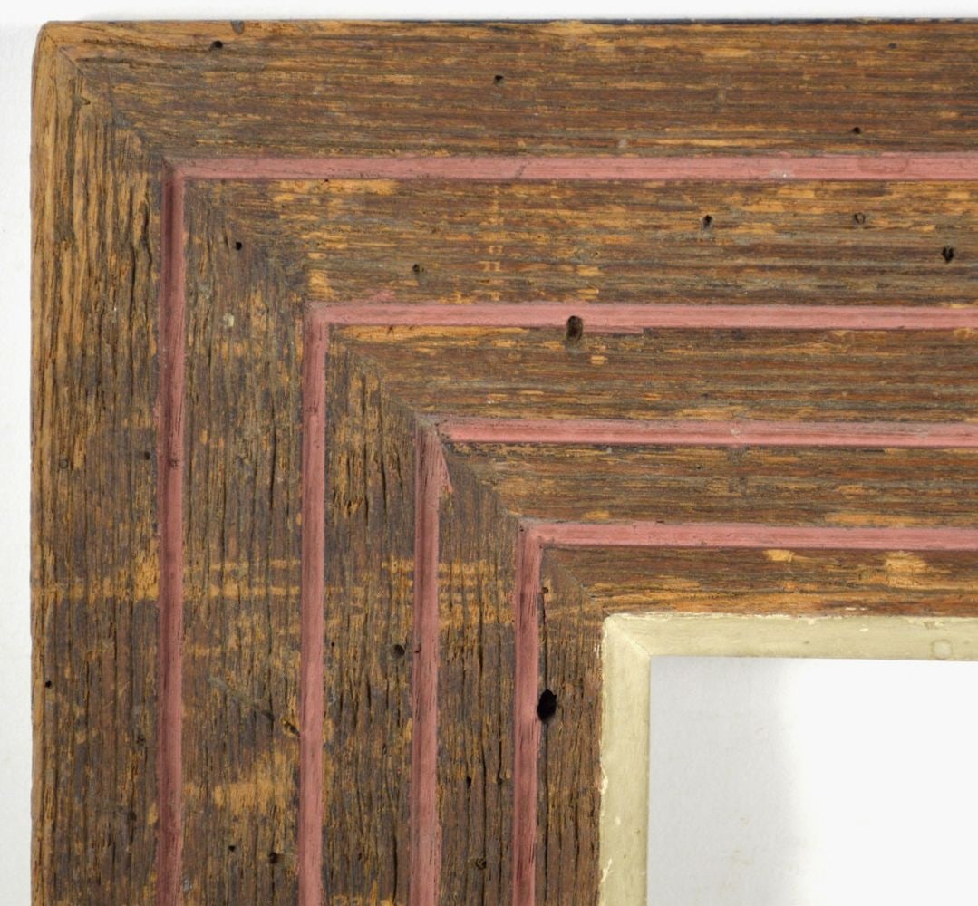 HEYDENRYK AMERICAN MODERNIST FRAME: A Heydenryk (label verso) modernist frame in wormy chestnut. A deceptively simple linear design. Measures: 18 5/8" x 21 5/8" Rabbet: 11 1/4" x 14 1/2"