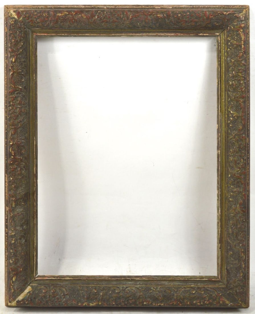 LOUIS XIII GILT FRAME: A Louis XIII frame with bronze gilt over red bole by Heydenryk. Measures: 21 7/8" x 17" Rabbet: 18 5/8" x 13 3/4"