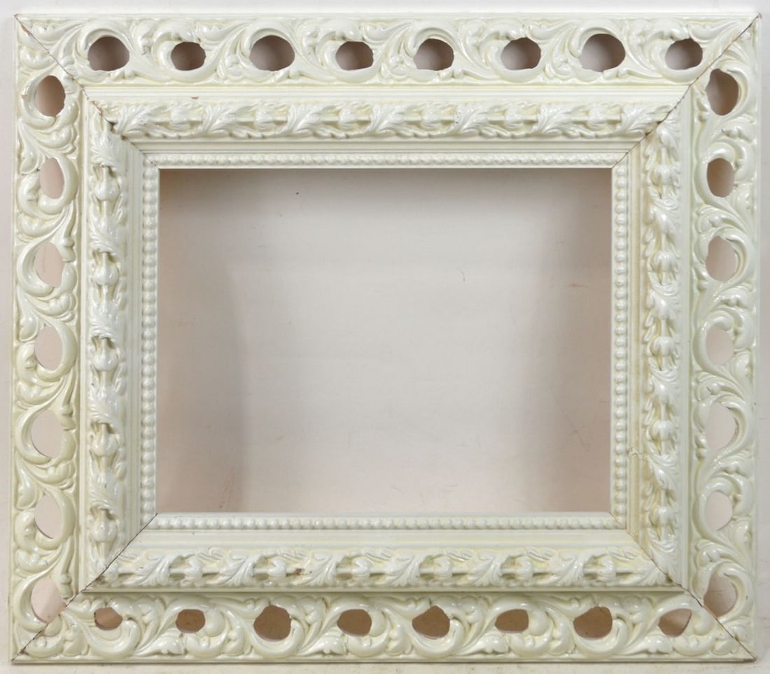 PIERCED AMERICAN FRAME IN GLOSS FINISH: A well made vintage frame with a pierced design and a finely applied high gloss finish. Measures: 21 1/8" x 18" Rabbet: 13 1/8" x 10"