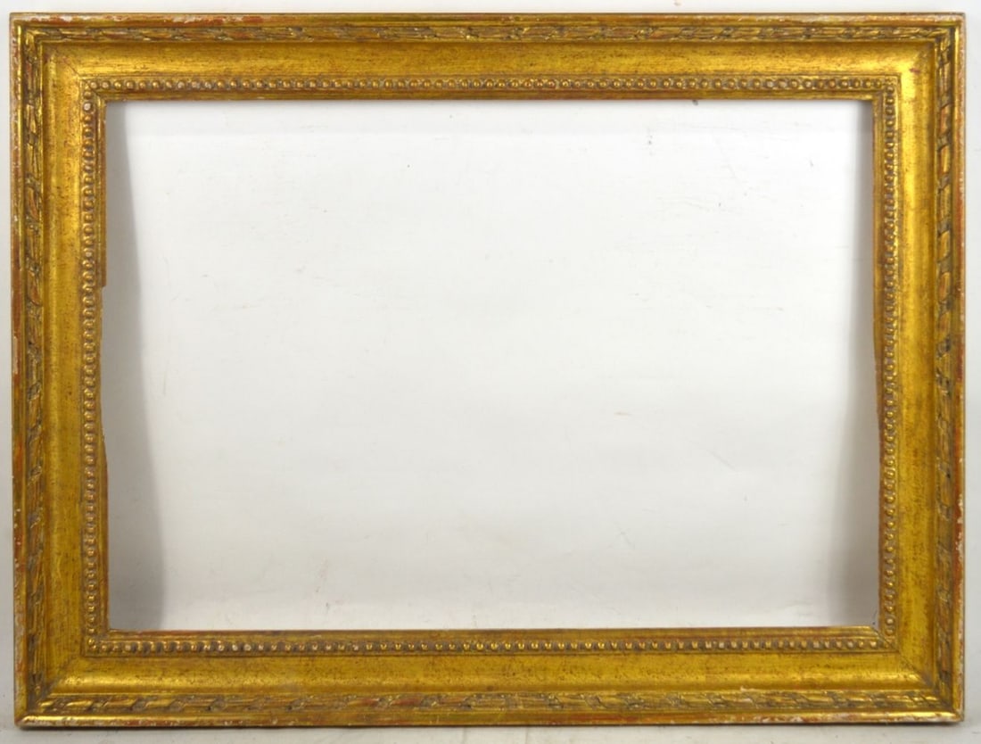 LOUIS XVI GILTWOOD FRAME: A Heydenryk carved and gilt wood Louis XVI frame. Measures: 31 1/2" x 23 3/4" Rabbet: 26 1/8" x 18 3/8"