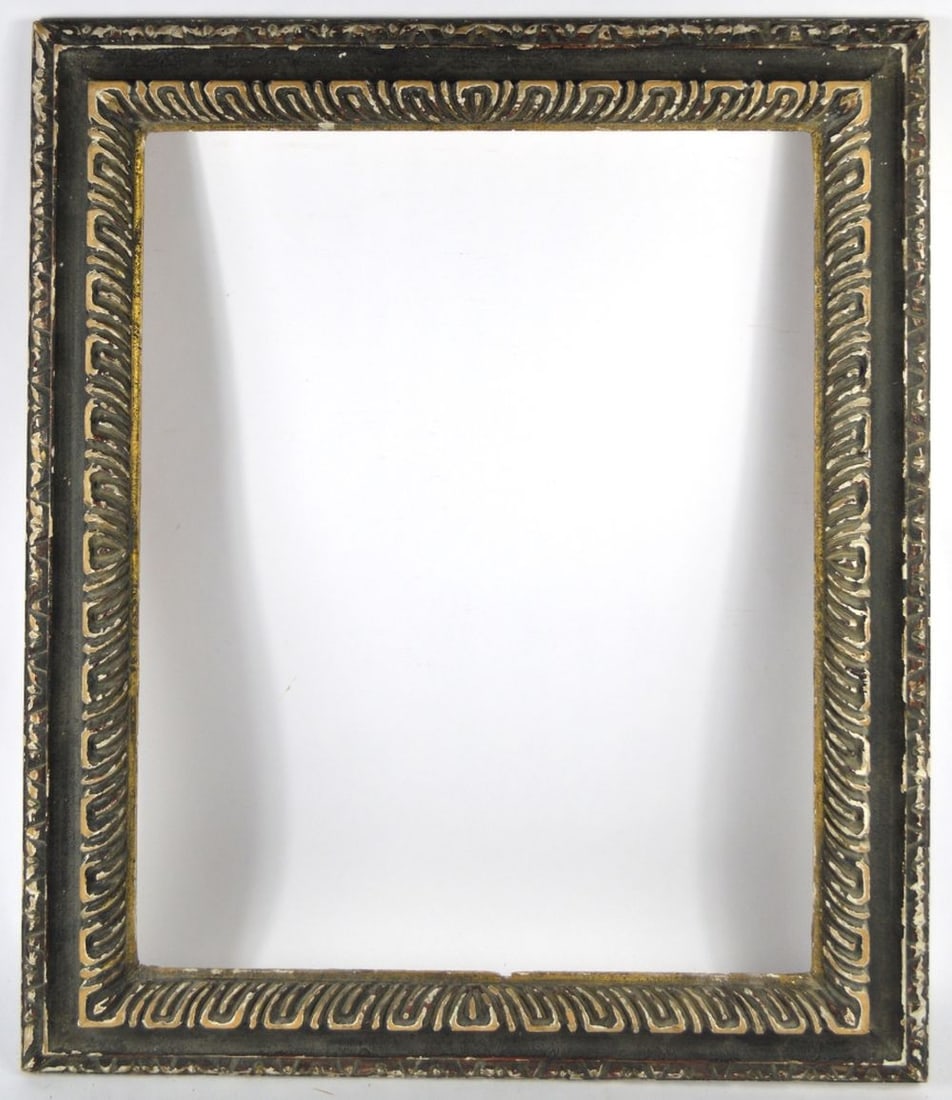 FINE SPANISH BAROQUE CARVED FRAME HEYDENRYK: A finely carved Spanish frame with an black finish and gilt inner edge. Measures: 32 1/2" x 26 1/2" Rabbet: 26 3/8" x 20 1/4"