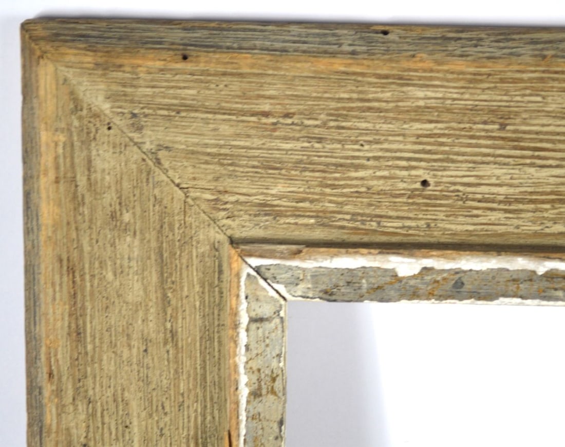 HEYDENRYK MODERNIST FRAME: A Heydenryk modernist frame with a silver gilt raised inner edge and slightly angled flat panel finished in a light gesso scumbling. Measures: 26 1/2" x 22 1/2" Rabbet: 20 1/4" x 16 1/4"