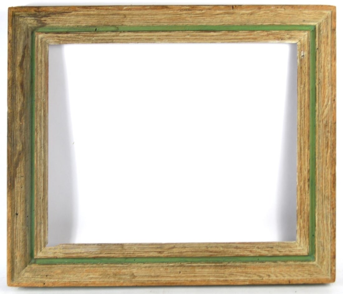 WORMY CHESTNUT HEYDENRYK FRAME: A modernist frame from Heydenryk with a moss green narrow cassetta strip in wormy chestnut. Measures: 25 1/2" x 21 1/4" Rabbet: 20 1/2" x 16 1/2"