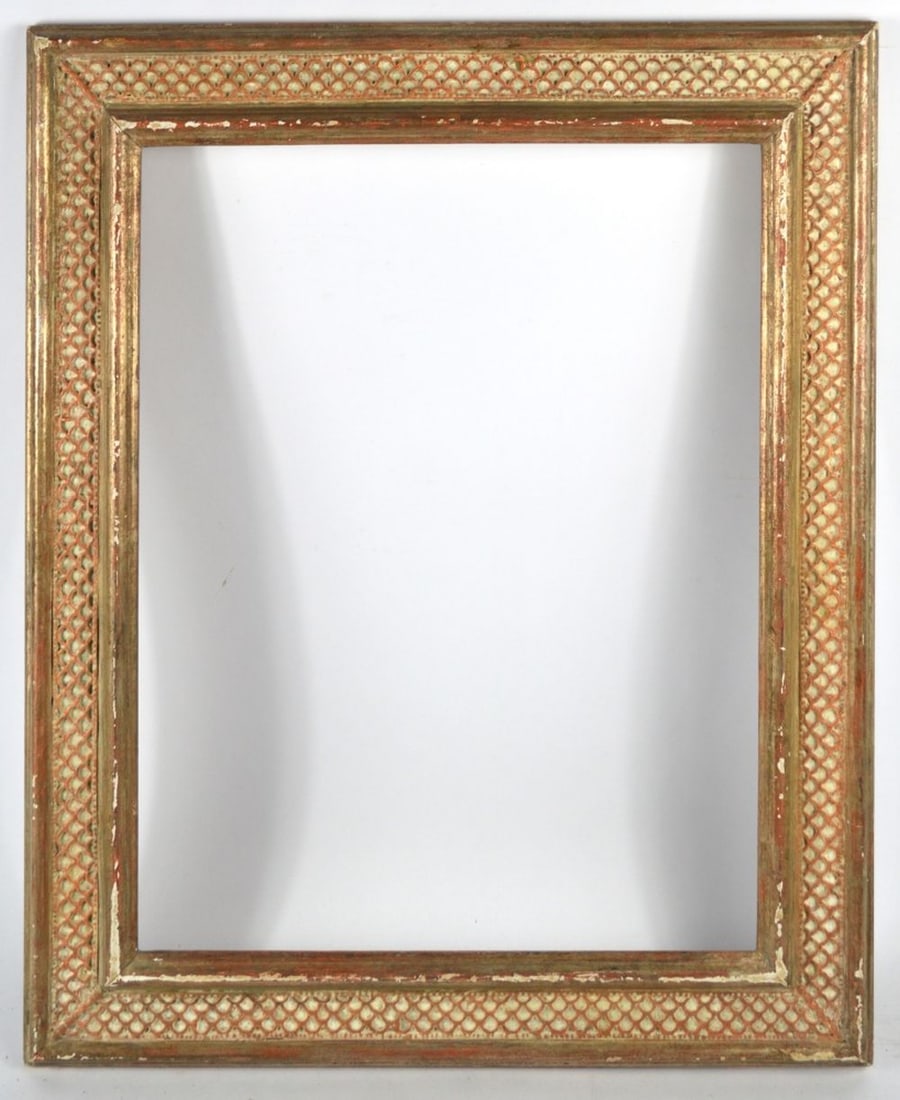 HONEYCOMB CARVED & GILT HEYDENRYK MODERNIST FRAME: An exquisite honeycomb carved and gilt frame from the House of Heydenryk. A delightful and beautiful frame. Measures: 25 1/2" x 21 1/2" Rabbet: 20 1/4" x 16 1/4"