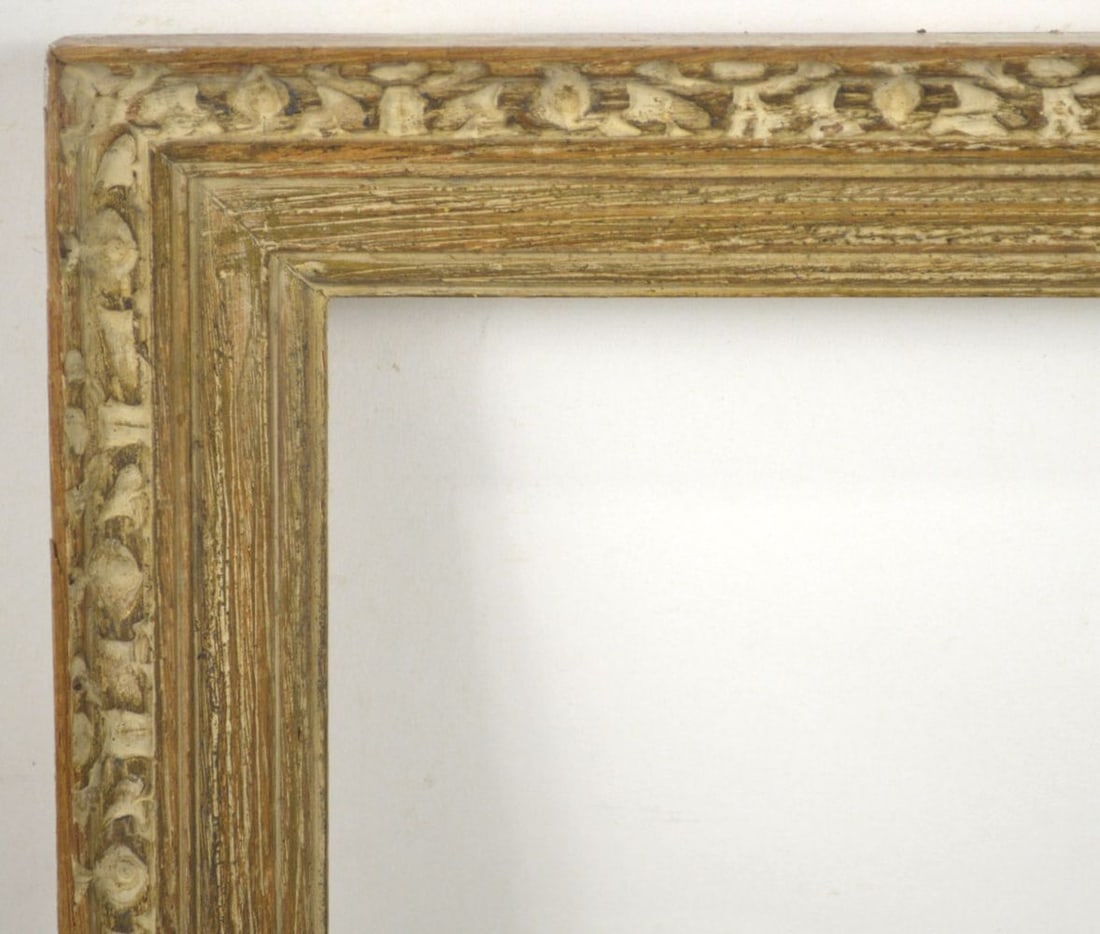 HEYDENRYK MODERNIST CARVED WOOD FRAME: A Heydenryk Italian modernist carved wood frame w a silver gilt exterior edges. Carving finished with parcel gilt and clay colored accents. Measures: 16" x 12 3/4" Rabbet: 13 1/2" x 10 1/2"