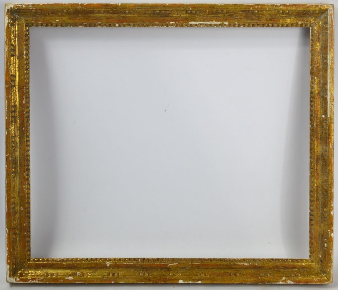 LOUIS XVI GILTWOOD FRAME: A carved and giltwood Louis XVI frame. \Measures: 20 1/2" x 17 1/2" Rabbet: 18 1/4" x 15 1/4"