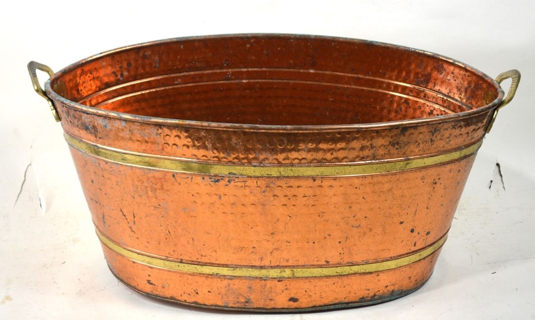 VINTAGE HAMMERED COPPER TUB / PLANTER: A large hammered copper (content unknown) tub or planter. A good decorative piece. Measures: 14" x 12 1/2" x 28"