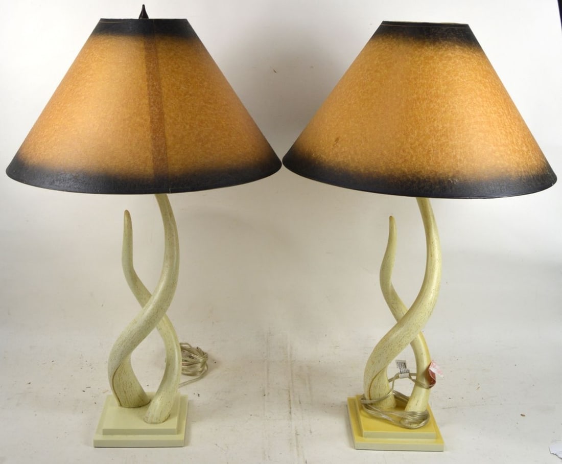 PAIR WEST ELM ANTELOPE HORN LAMPS: A pair of West Elm "antelope" horn table lamps with shades. Measures: 29 1/2" x 19" x 19"