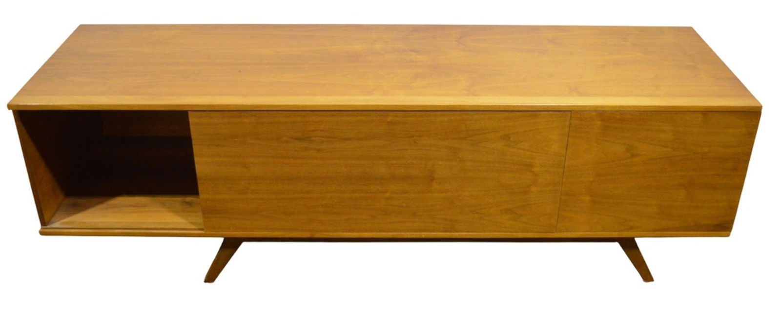 MID CENTURY MODERN CREDENZA: A high quality modernist credenza with sliding doors. Mid century modern design. Custom ordered from a California cabinet maker. No visible marks. Measures: 26 1/4" x 84" x 24"