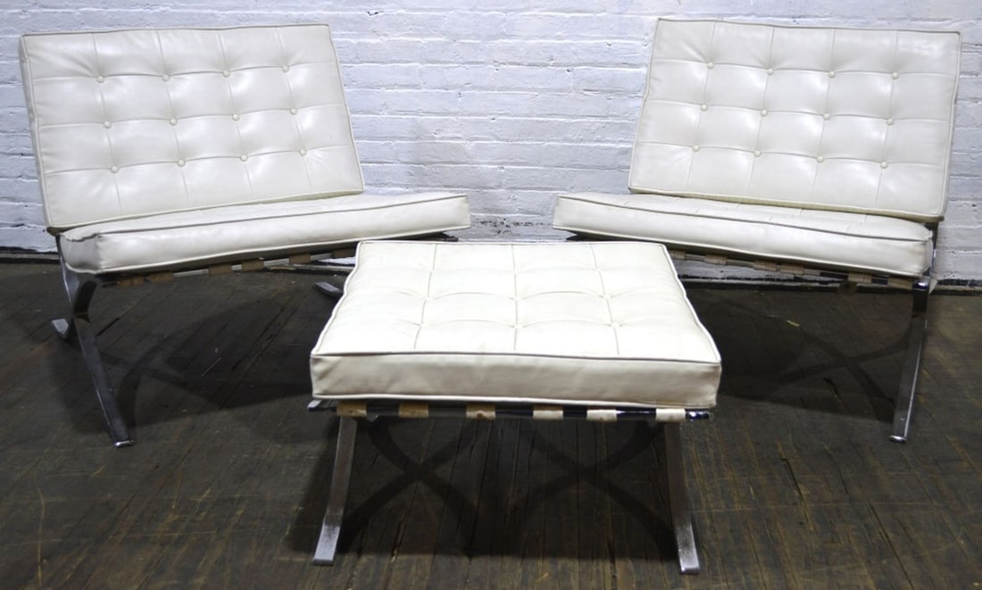 2 BARCELONA CHAIRS WITH OTTOMAN: A set of 2 steel frame Barcelona chairs with tufted naugahyde cushions. Manufactured by Charlton Company (Mass). Measures: 28" x 33" x 29 1/2"