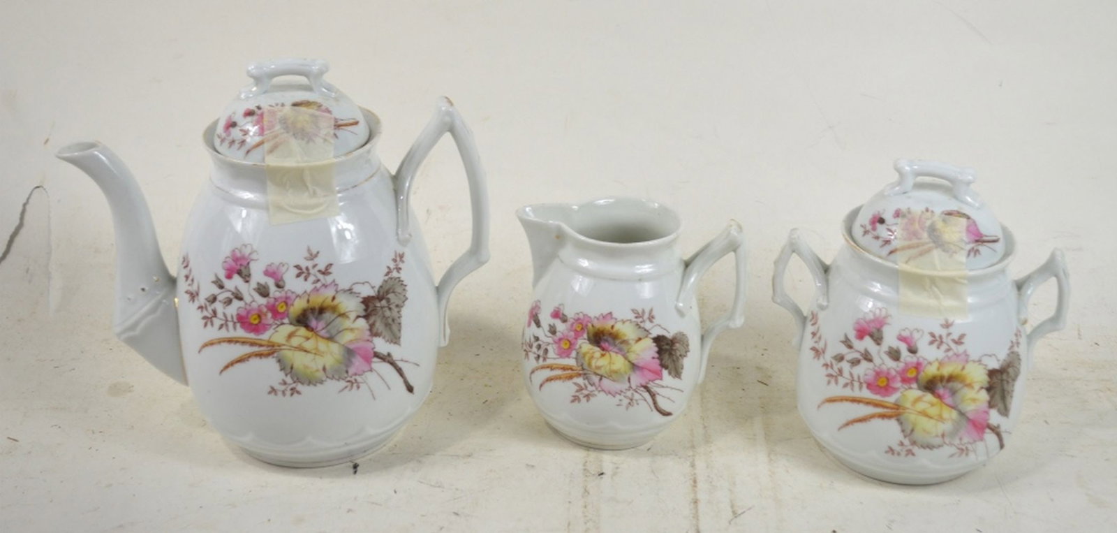 ANTIQUE BSM PORCELAIN TEA SET: An antique, C. 1880-1890's BSM (Brothers Schwalb Merklin) 3 piece decorated porcelain tea set. Marked to the underside. Measures: Largest 9" x 9 1/2" x 6"