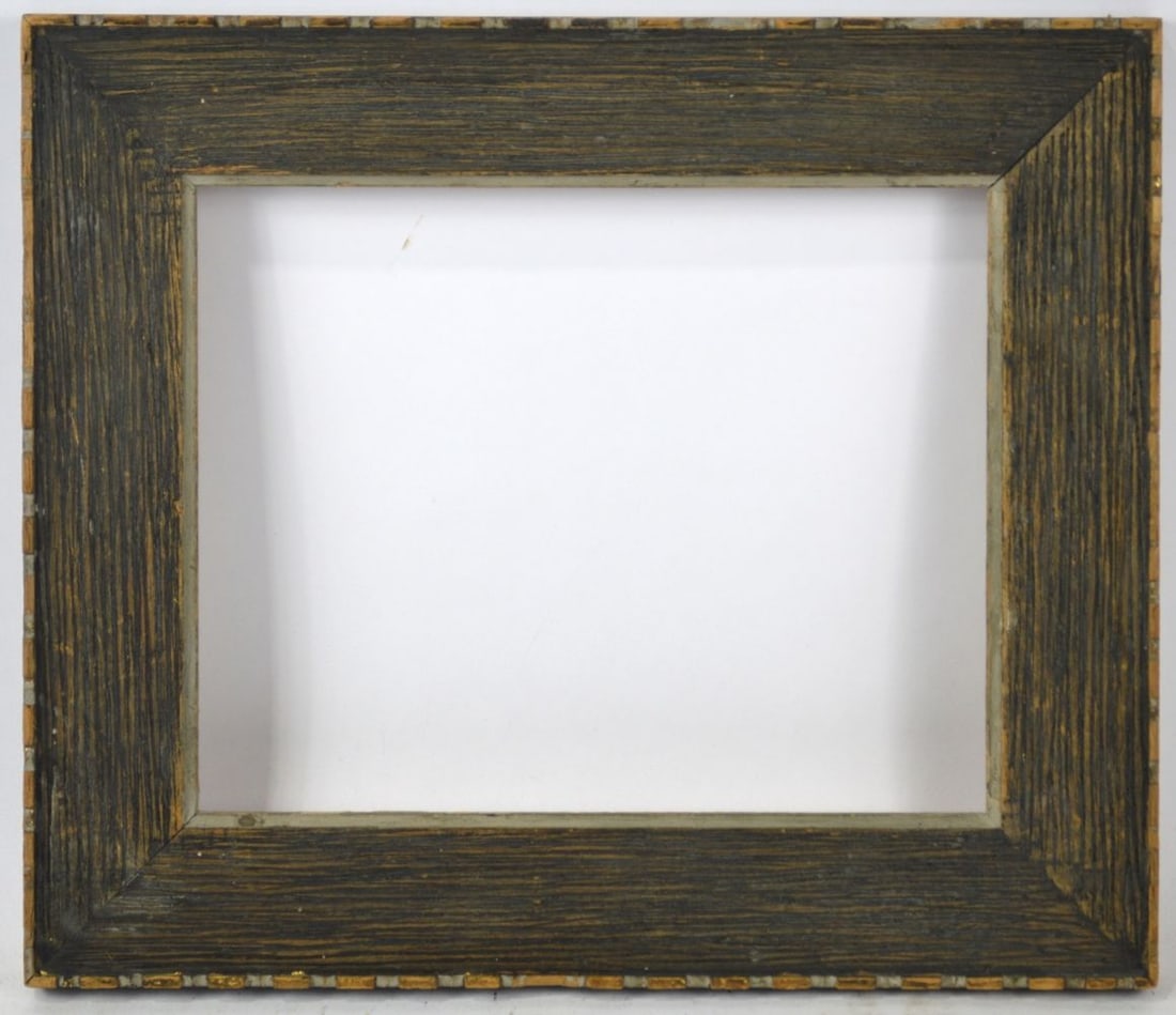 HEYDENRYK MODERNIST CASSETTA FRAME 10X12: A simple modernist frame from Heydenryk. An amphora type cassetta form with dental outer edge carving (with remnants of gilt finish). Measures: 16" x 13 3/4" Rabbet: 12" x 9 3/4"