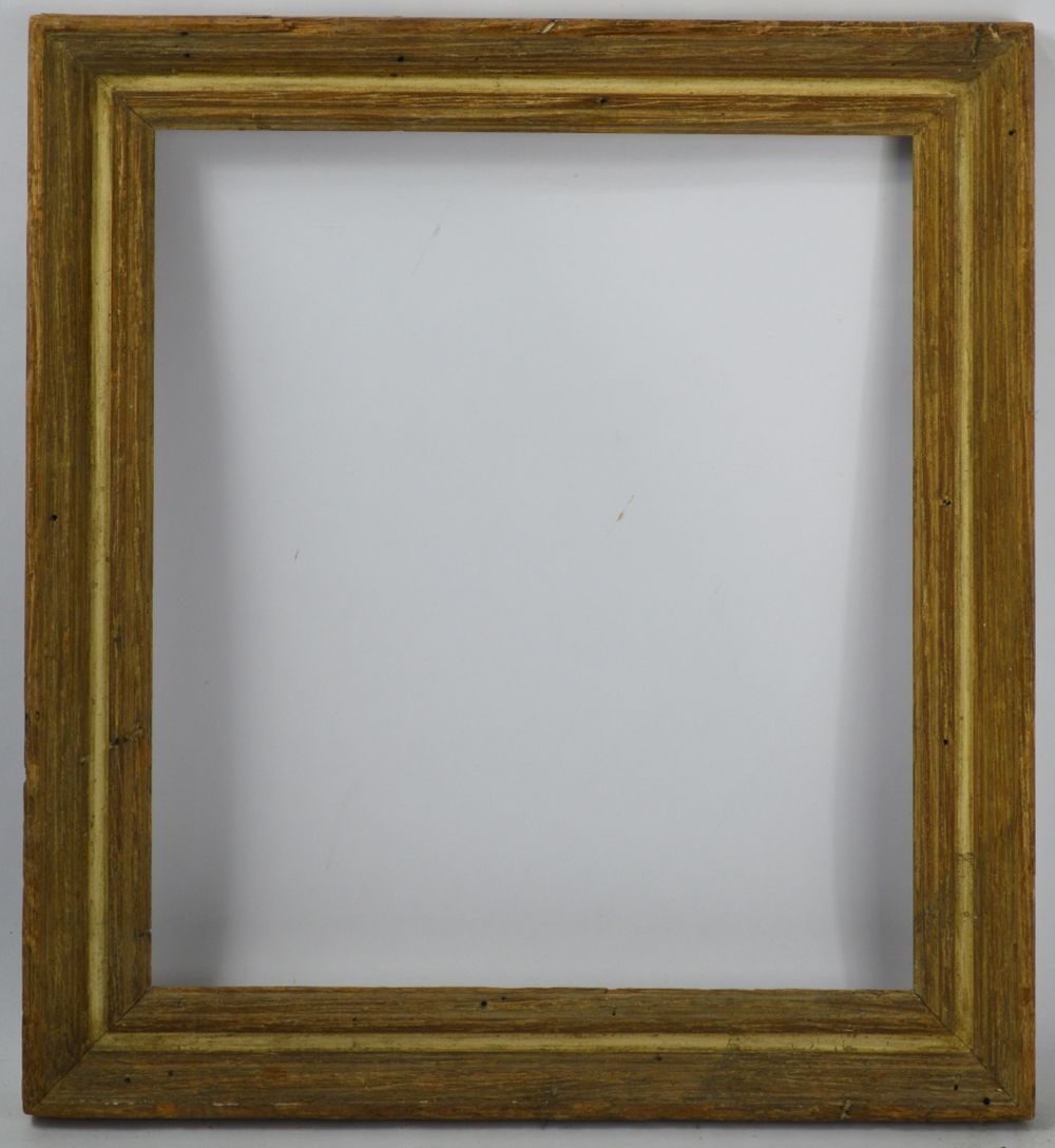 AMERICAN MODERNIST WORMY CHESTNUT FRAME: A Heydenryk wormy chestnut American modernist frame with a narrow cream colored cassetta strip. Measures: 19 3/4" x 17 3/4" Rabbet: 16 1/4" x 14 1/4"