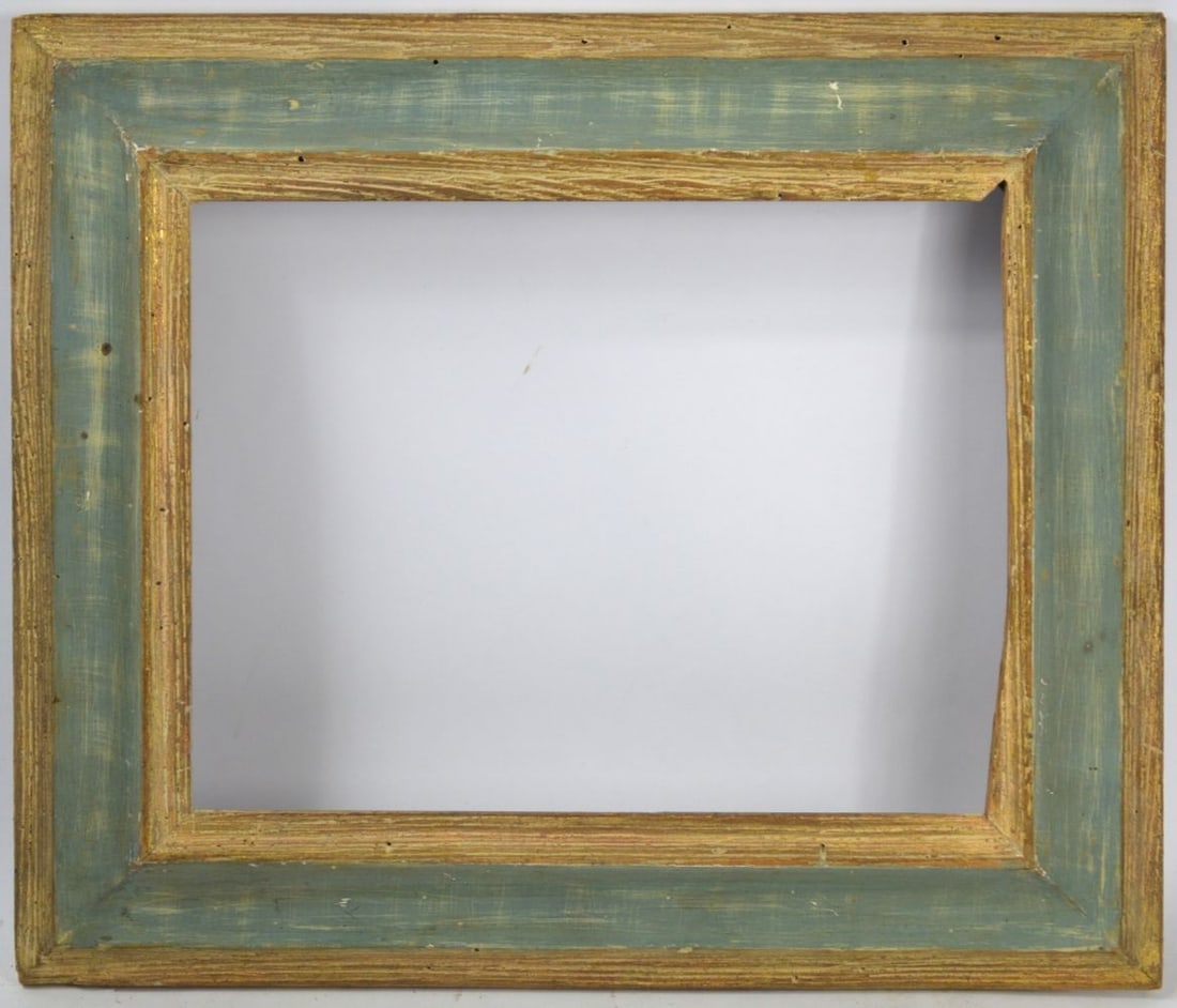 AMERICAN MODERNIST WORMY CHESTNUT FRAME: An American modernist wormy chestnut receding shallow scoop frame with an aquamarine monochrome finish and gesso scumbling. Measures: 20" x 17" Rabbet: 14 1/2" x 11 1/2"