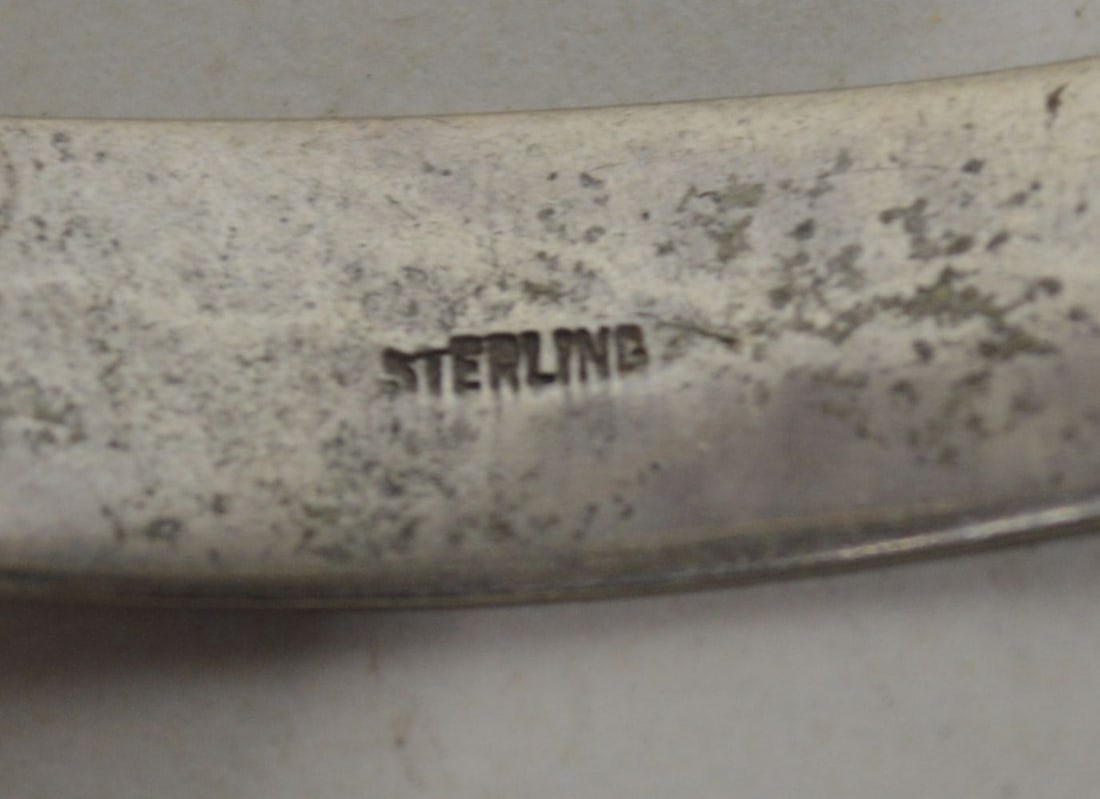 4 PIECES STERLING SILVER JEWELRY 2.8 OZT: A sterling silver jewelry grouping. All marked as sterling/.925, Thick cuff marked (S. Kirk & Son). Weight: 2.8 OZT Measures: Largest 6" x 5" x 1